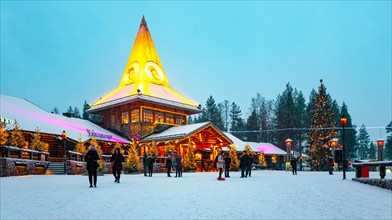 Rovaniemi, Finland - November 29, 2018: Gift shops and restaurants in Central Square of the Santa Claus Village and Park