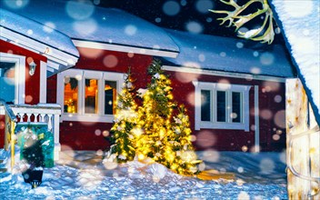 House reindeer farm in winter Lapland Finland night snowfall new