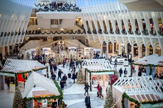 Shoppers and tourists in the Holiday Market in the Westfield Mall in the Oculus in the World Trade Center Transportation Hub in Lower Manhattan in New York on Sunday, December 8, 2019.  (© Richard B. ...