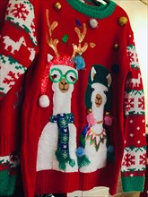 Macy's flagship department store features humorous ugly sweaters during the holiday season, New York City, USA