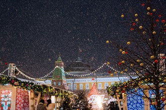 December 25, 2020, Moscow, Russia. New Year's Fair on Red Square in Moscow during a snowfall.