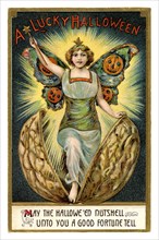 Vintage Halloween greeting card / postcard. Early 1900s. A Lucky Halloween. A girl and a nutshell.