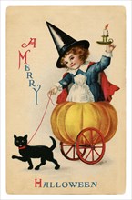 Vintage Halloween greeting card / postcard. Early 1900s. A Merry Halloween. A girl in wagon with a black cat.