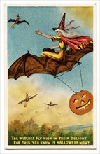 Vintage Halloween greeting card / postcard. Early 1900s. A witch flying on a bat.