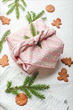 Christmas eco-friendly gift wrap in traditional japanese furoshiki style, eco-friendly gift wrap and Zero Wast concept