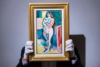 London, UK.  18 November 2021.  A staff member presents “Nu (femme) debut, dit aussi Nu pres du paravent” (Standing Nude), 1905-06, by Henri Matisse (Est. £1,800,000-2,500,000).  The work leads Bonham...