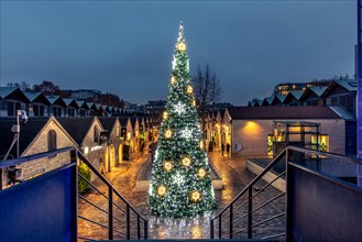 Paris, France - December 9, 2020: Beautiful Christmas tree in Bercy Village (cour Saint-Emilion) in Paris, France