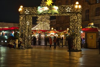 COLOGNE, GERMANY - Dec 06, 2021: view of the traditional cologne christmas market in the dark