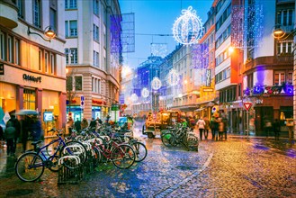 Strasbourg, France - December 2017: Street winter decorations in central Strasbourg at Le Gruber Restaurant during Christmas Market, Alsace.