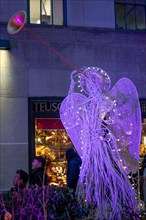 Herald Angel Figure at Rockefeller Center during the holiday season, NYC, USA  2022