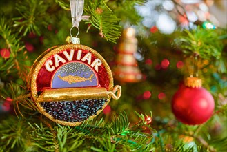 Caviar tin hanging Christmas ornament.