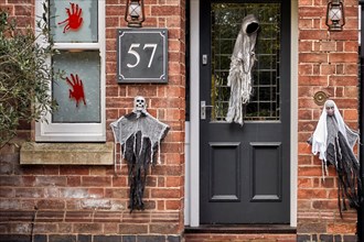 Halloween house decorated with traditional spooky and scary figures. England UK