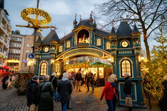 entrance portal to the christmas market heinzels wintermaerchen in the old town of cologne at dusk