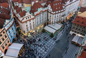 This is an aerial view of the Old Town Square in Prague during the Christmas Market on December 08, 2022 in Prague, Czech Republic