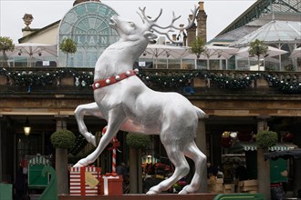 Giant silver Christmas Reindeer outside Covent Garden Market