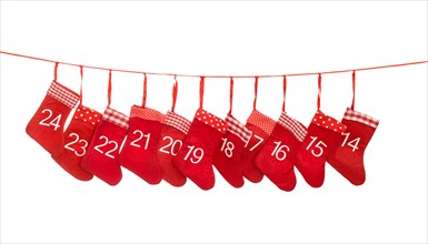 Advent calendar 14-24. Red christmas stocking isolated on white background. Holidays decoration