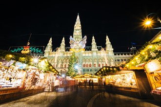 Christmas Market at Rathausplatz at night, in Vienna, Austria.