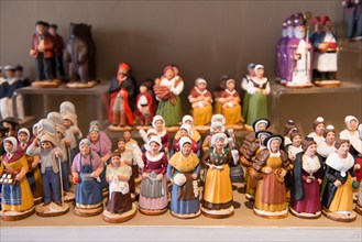 Ceramic figurines on display at Atelier Arterra, a workshop and store located in the Panier neighborhood of Marseille, France.