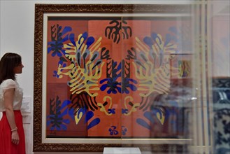 London, UK.  1 August 2017.  A visitor views "Panel with Mask", 1947 shown reflected in display.  Preview of "Matisse in the Studio", at the Royal Academy of Arts, Piccadilly, the first exhibition to ...