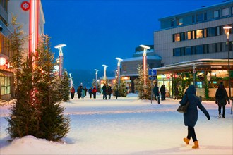 Rovaniemi, Finland - March 1, 2017: Tourists at Lordi Square on winter Rovaniemi, Lapland, Finland, at night.