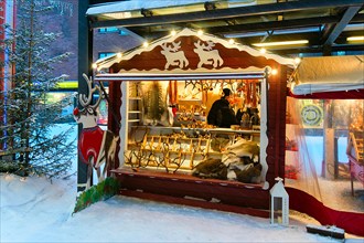 Rovaniemi, Finland - March 1, 2017: Street Market stall with traditional souvenirs in winter Rovaniemi, Lapland, in Finland.