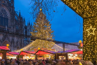 Shopping people Christmas market at square near Kolner Dom