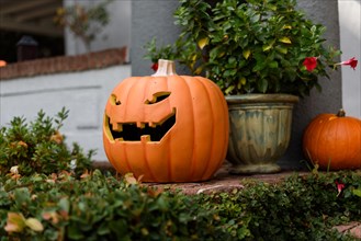 Halloween in front of house decorations