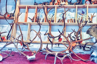 Winter Saami Souvenirs such as reindeer horns on Finnish Christmas Market in Rovaniemi, Finland, Lapland. At the North Arctic Pole.