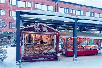 Winter Saami Souvenirs on Street Finnish Christmas Market in Rovaniemi, Finland, Lapland. At the North Arctic Pole.