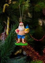 Australian Father Christmas decoration hanging on a Christmas tree in Australia