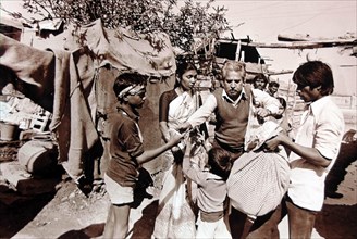 man distributing food, union carbide gas leak tragedy, Bhopal, madhya pradesh, India, Asia