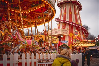 London, UK - November, 2018. Crowd of people at a typical Christmas Fun Fair.