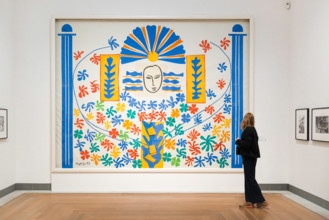 Matisse painting, view of a young woman looking at Apollo (1953) by Henri Matisse inside the Moderna Museet, Skeppsholmen, central Stockholm, Sweden.