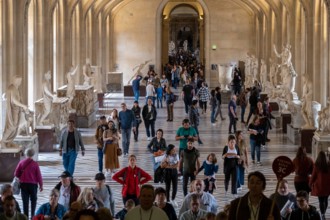 Tourists visiting the Louvre Museum in Paris, France, Europe