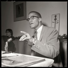 Malcolm X in Chicago, Illinois. May, 1961. Nation of Islam and Black Muslim leader. Image from 2.25 x 2.25 inch negative.