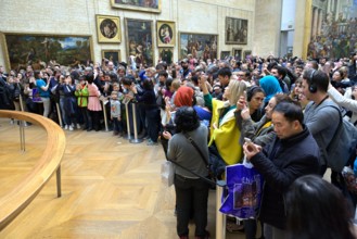 Everyone wants to see the Mona Lisa in the Louvre, Paris FR