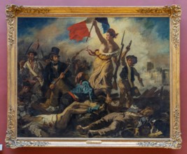 Paris, France - 21 05 2021: Louvre Museum. Denon wing. Liberty leading the people painting by Eugene Delacroix