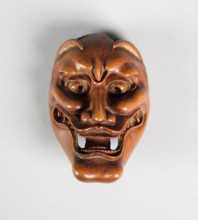 Netsuke of Noh Mask: Hannya 19th century Japan. Netsuke of Noh Mask: Hannya. Japan. 19th century. Wood. Edo (1615–1868) or Meiji period (1868–1912). Netsuke