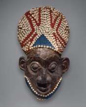 Helmet Mask before 1880 Bamum kingdom In the socially and politically stratified polities of the Grassfields Kingdoms of Cameroon, the display and ownership of masks are important indicators of privil...