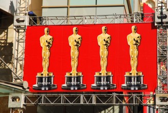 A banner depicting the Oscars hangs over Hollywood Boulevard prior to the start of the Academy Awards ceremony at the Dolby Theater in Hollywood