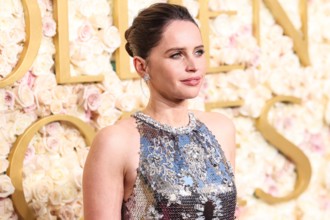 BEVERLY HILLS, LOS ANGELES, CALIFORNIA, USA - JANUARY 05: Felicity Jones wearing Prada with Chopard jewelry arrives at the 82nd Annual Golden Globe Awards ceremony for excellence in film and American ...