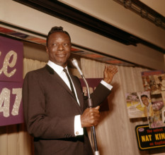 NAT KING COLE (1919-1965) American singer in 1964. Photo Tony Gale