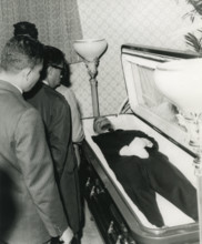 MALCOLM X  - US Black Muslim leader after his murder in February 1965 his body was displayed at the Unity Funeral Home in Harlem