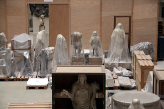 packed statues at the louvre museum in paris france