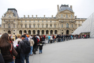 standing in line to enter the Paris Louvre, France