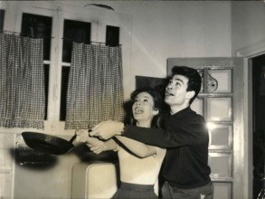 Jan. 01, 1959 -  Candlemas: Photo shows Pascale Audret And Claude Titre, the new couple No.1 of the French screen, busy making pancakes for Candlemas.