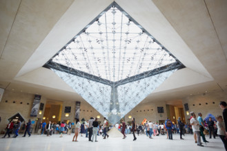 Paris, Inverted pyramid in the shopping mall 'Carrousel du Louvre' with people