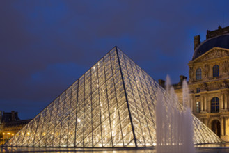 The main (Pyramid) entrance of the Louvre, Paris, France.