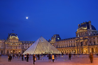 The Louvre Museum (Musée du Louvre) and its glass pyramid (architect: I.M. Pei), Paris, France.