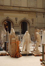 12 April 2016 - Paris, France: Statues and sculptures packed in foil in a storage room of the Louvre museum in Paris.